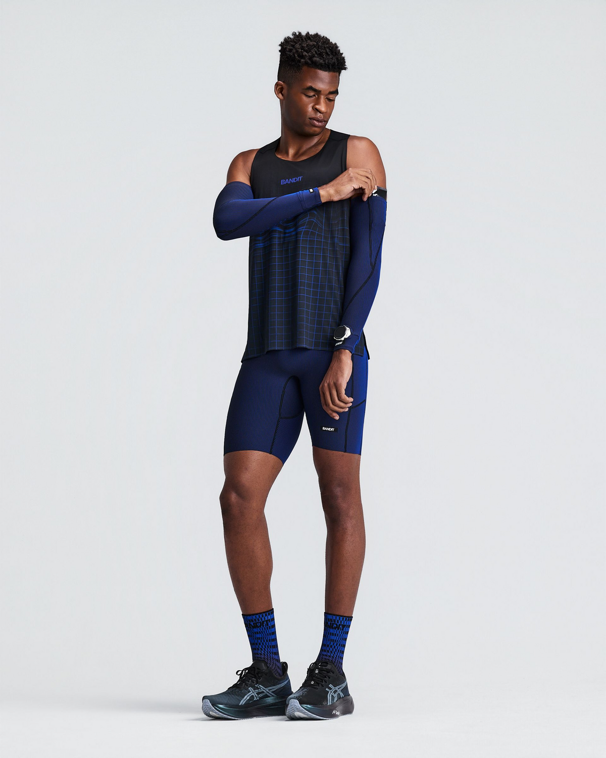 Striped Cadence™ Compression Sleeves - Black / Bauhaus Blue