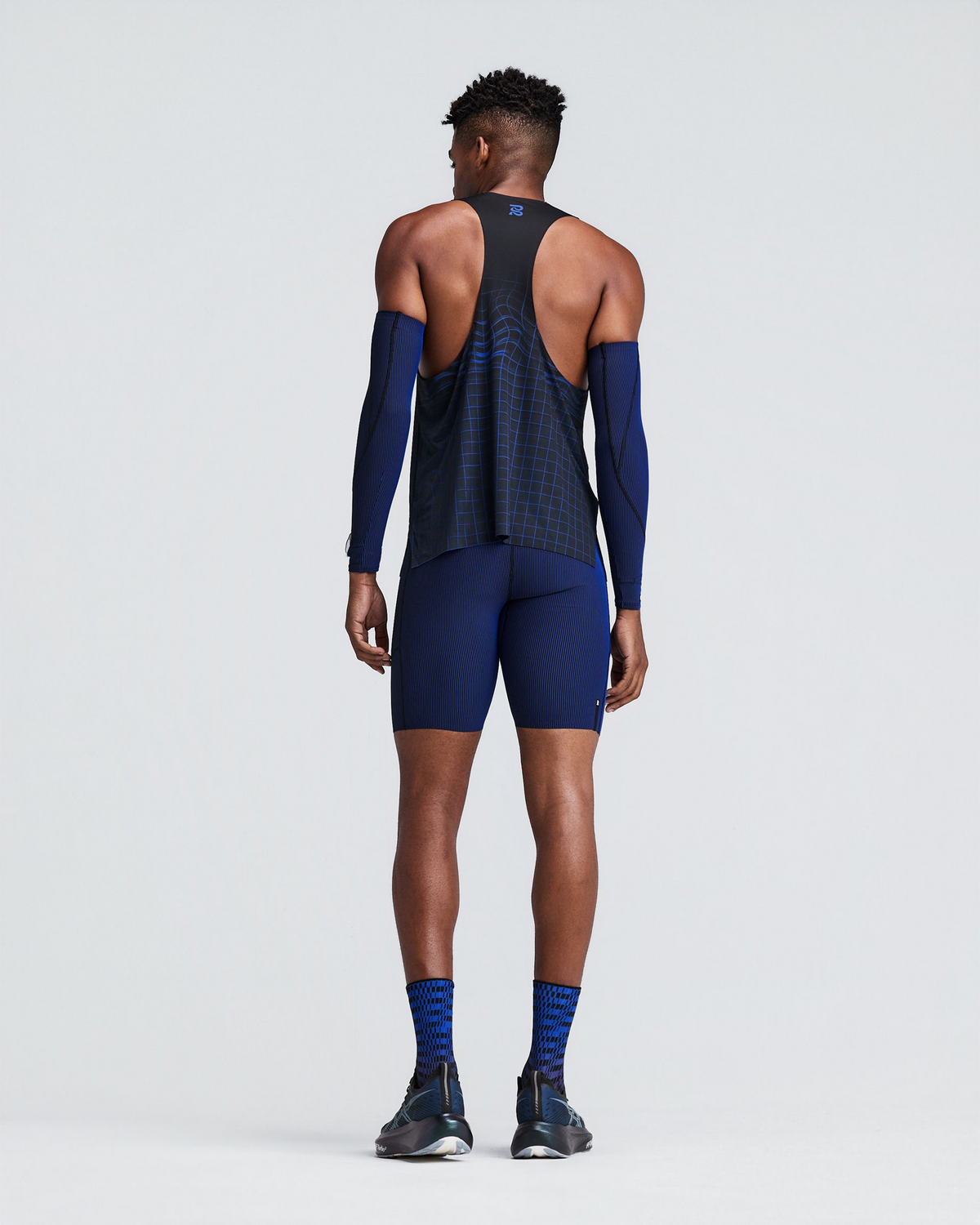 Striped Cadence™ Compression Sleeves - Black / Bauhaus Blue